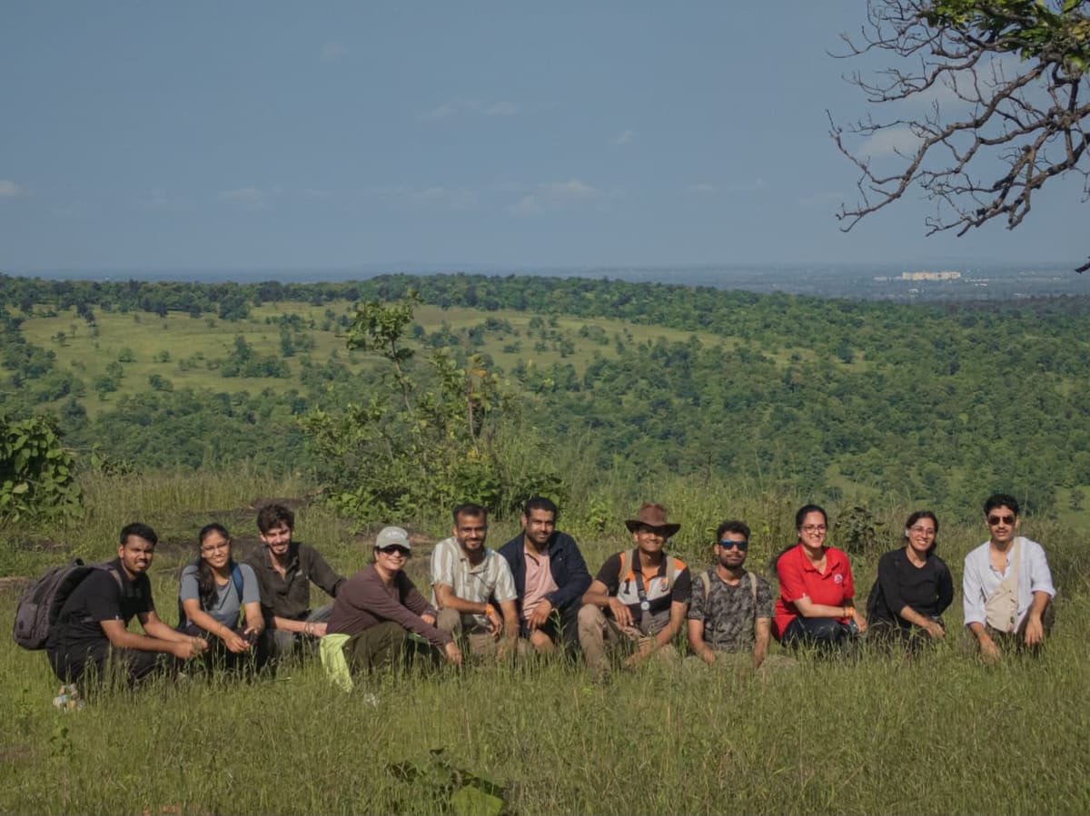the whole group, valley behind them