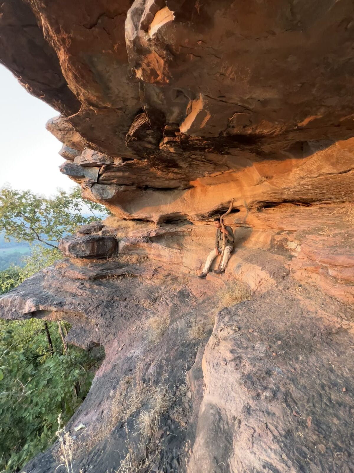 under the overhang, where history speaks in stone
